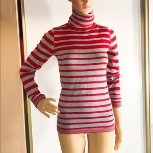Red and grey striped turtle neck sweater